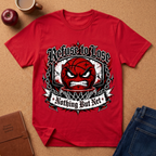 A red short-sleeve graphic T-shirt laid flat on a cork-like surface, surrounded by a coffee mug, apple, notebook, and jeans as styled props. The shirt features a large basketball-themed graphic with the text 'Refuse to Lose' and 'Nothing But Net' in a distressed black-and-white design.