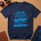 A navy blue graphic t-shirt with a bright blue text print reading 'Living PROOF THAT HISTORY REPEATS ITSELF.