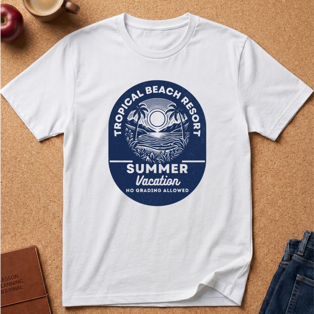 A white short-sleeve crewneck t-shirt laid flat on a cork background, featuring a circular blue graphic print that reads 'TROPICAL BEACH RESORT SUMMER Vacation NO GRADING ALLOWED' with palm trees and a sun.