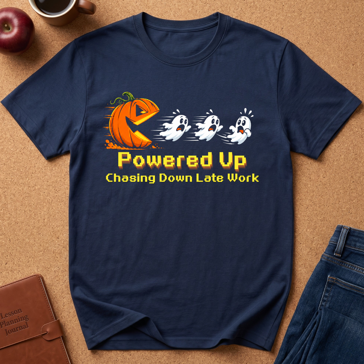 Black t-shirt with a funny graphic of a jack o lantern shapped like a pacman chasing 3 scared ghosts, says Powered Up Pasing down late work.  