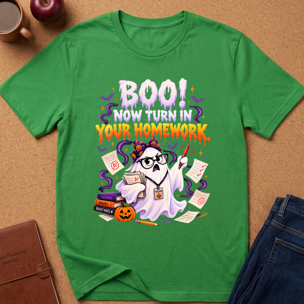 Irish Green Graphic short sleeves T-Shirt with a cute ghost looking upset with a red pen and a pile of graded homework, saying BOO, Now Turn In Your Homework.