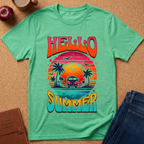 A mint green graphic t-shirt laid flat on a cork background, featuring a retro sunset design with palm trees, a retro car, and the words 'HELLO SUMMER'.