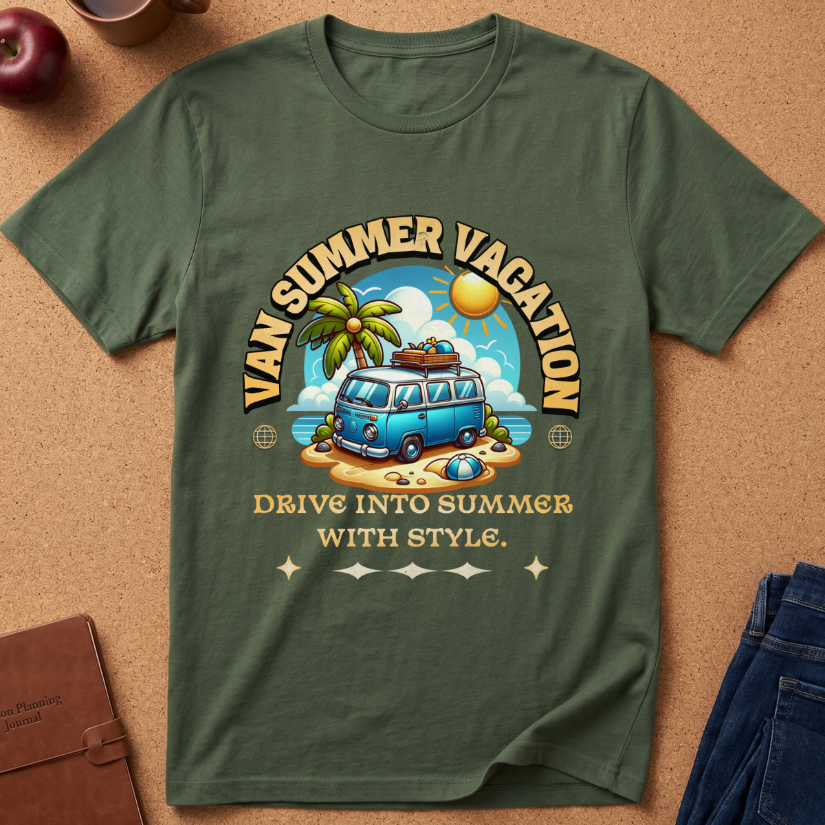 An olive green short-sleeve t-shirt laid flat on a cork background, featuring a colorful retro graphic of a blue van on a beach with the text 'VAN SUMMER VACATION' and 'DRIVE INTO SUMMER WITH STYLE.'.