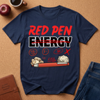 Navy blue graphic t-shirt with 'Red Pen Energy' with '20/50, F minus, No, Fail and X" scattered with a red pen and crumpled paper graphic design on a brown surface with an apple, coffee, and jeans.
