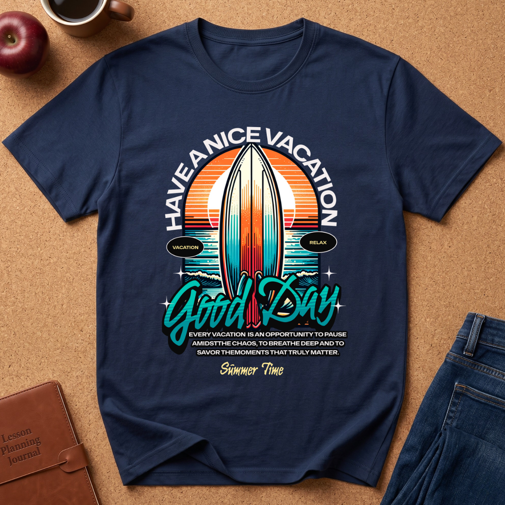 A navy blue graphic t-shirt laid flat on a brown cork background, surrounded by lifestyle props including a coffee cup, an apple, a notebook, and jeans. The t-shirt features a retro surfboard design with the text 'HAVE A NICE VACATION Good Day' and a humorous vacation-themed quote.