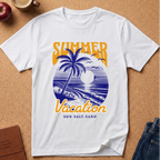A white short-sleeve T-shirt laid flat on a cork board background, featuring a retro-style tropical beach graphic with the words “SUMMER Vacation” in yellow and blue, plus “SUN-SALT SAND” below. Styled flat-lay props include an apple, a coffee cup, a journal, and jeans around the shirt.